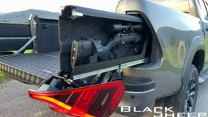 Toyota Hilux lockable, hidden (concealed) rearlight gun compartment by Black Sheep Innovations GmbH