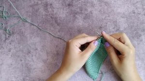 Две лицевые петли с наклоном влево