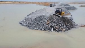 Строительство, дорога на озере очередной обзор
