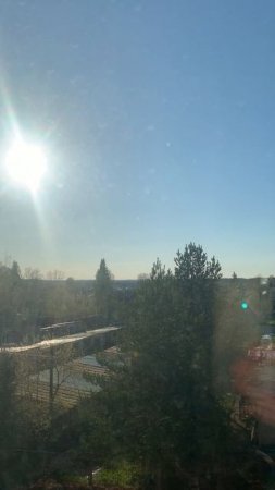 The weather outside the window in our village: гаражный кооператив на солнце