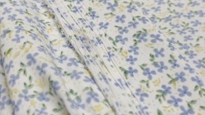 Принтованная плательная ткань, с рисунком "Мелкие разноцветные цветочки на белом"
28-11387