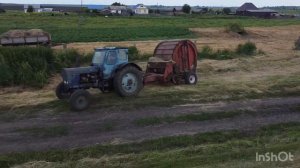 МТЗ 50 с рулонником в работе