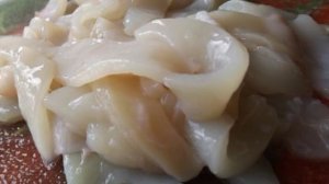 Кальмары тушеные в сметане