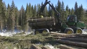 Самый совершенный форвардер John Deere 1510 E .