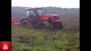 ТРАКТОРЫ ПО БЕЗДОРОЖЬЮ. Трактор застрял в грязи.  Уник?