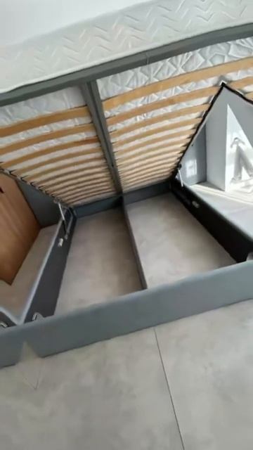 Кровать с мягким длинным изголовьем и розетками по бокам 160 на 200