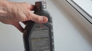 Моторное масло синтетика ZIC 10W-40 .