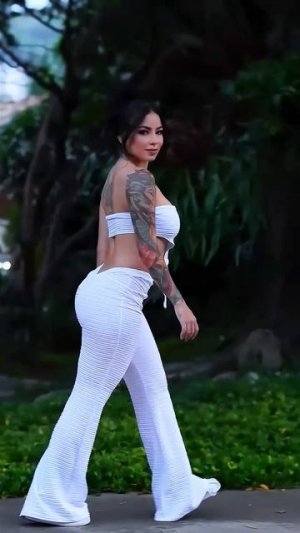CJzgC5eKabU - Beautiful model in tight palazzo pants summer outfit idea #fashion  #style #outfit #sh