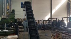 Транспортер для удаления опила Z-образный в действии
