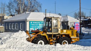 Фронтальный погрузчик Амкодор-333В (ТО-18Б.3). Работа по уборке снега.