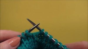 Убавление петель спицами с наклоном влево