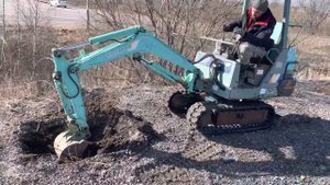Работа экскаватора yanmar b12