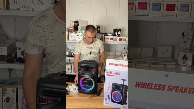 Портативна блютуз колонка з мікрофоном ручкою на коле смотреть онлайн