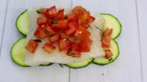 Филе тилапии, запеченное с овощами