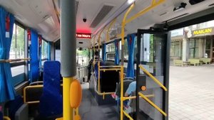 Объявление остановок на двух языках в троллейбусе Алматы.