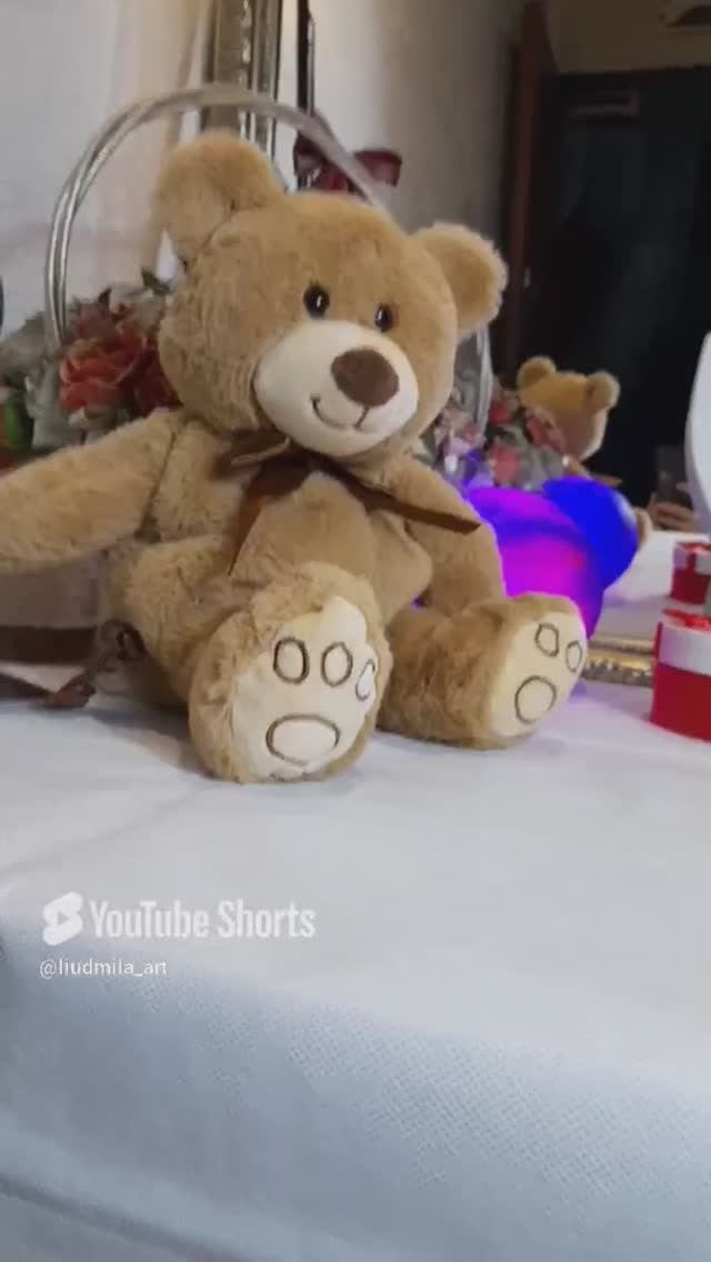 Плюшевый рюкзак медведь