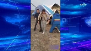 Новые кадры с момента падения самолета AZAL в городе Акт
