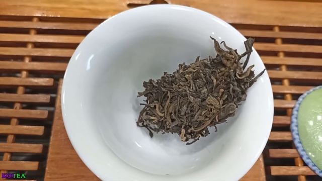 Шен Пуэр Цинмин Цзыгуан от Цзюнь Чжун Хао 2014 г. 200 гр.