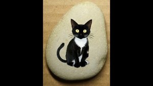 Оживший рисунок кота на камне.