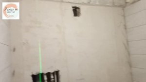 Укладка плитки в санузле. Рисунок на 2 стенах.