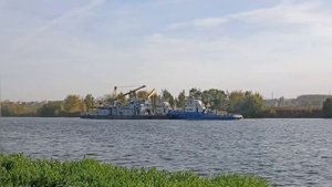 Два буксира-толкача "Петрозводск" и "Печора", ведут вни?