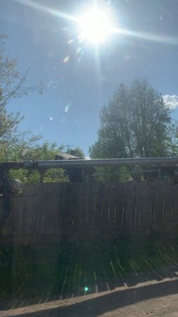 The weather outside the window in our village: отблески солнца
