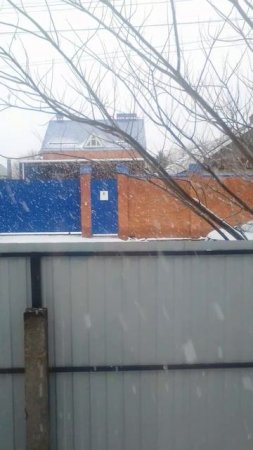 Снег в окошке.
