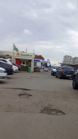разбитая дорога перед торговым центром ягодная слобода