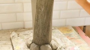 Из жестяной трубы и цемента сделал оригинальную вазу ?