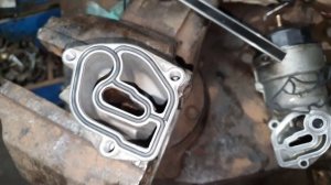 642 мотор прокладка в корпусе масленного фильтра.