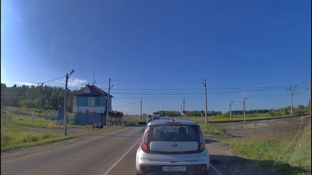 Железнодорожный переезд со шлагбаумом