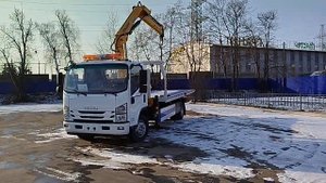 ИСУЗУ эвакуатор с КМУ XCMG работа крановой установки 2025-