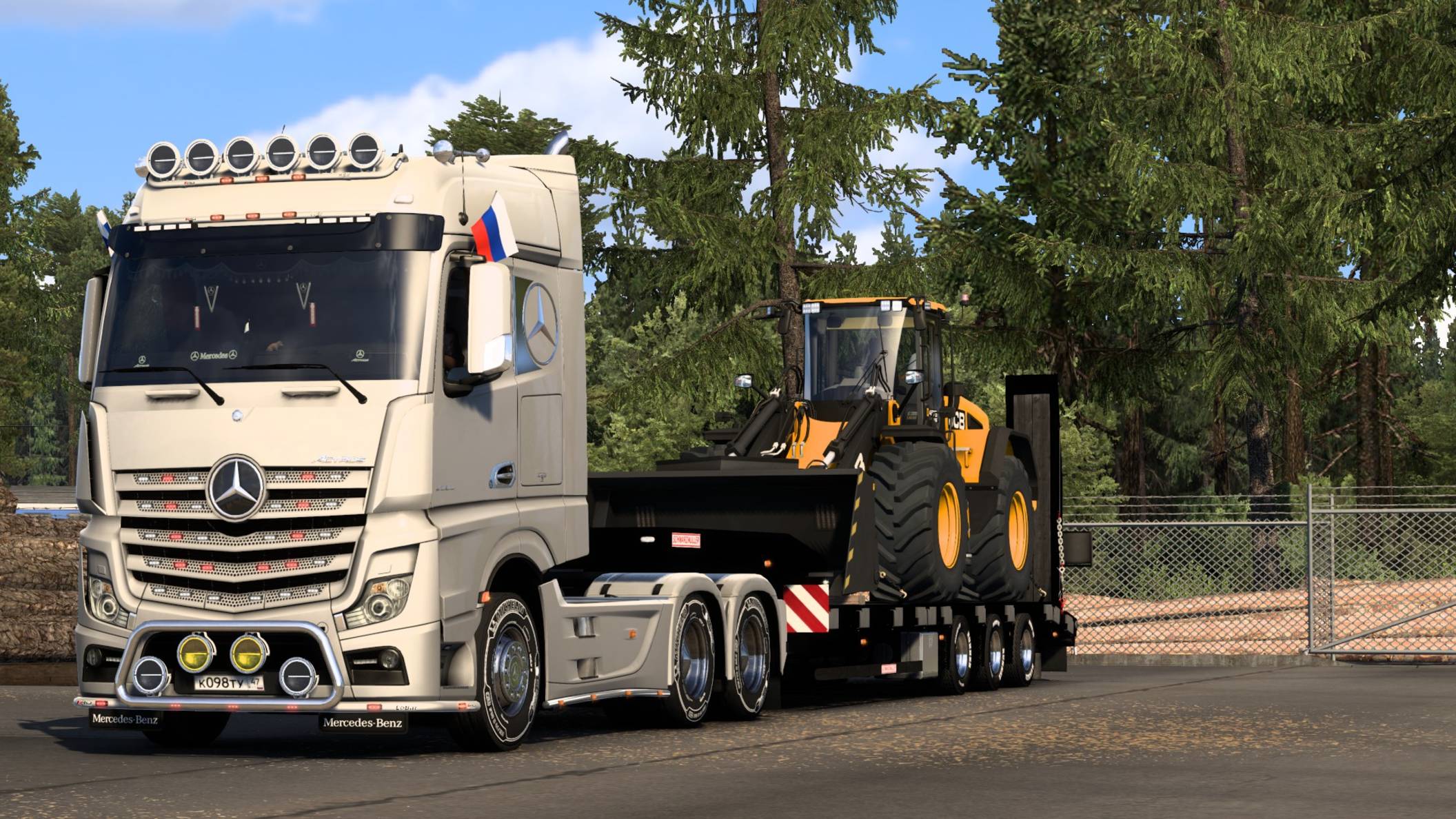 Mercedes Actros Перевозка Колёсного погрузчика JCB.