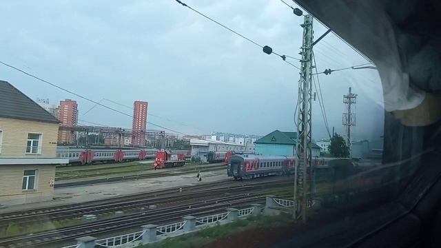 Новосибирск отправление из окна поезда Железнодорожные развязки и городские пейзажи