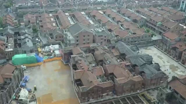 В Шанхае 432 робота передвинули район с общим весом построек 7500 тонн!