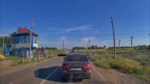 Железнодорожный переезд со шлагбаумом