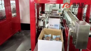 Автоматическая система сбора бисквитных изделий в короб и укладки на поддон