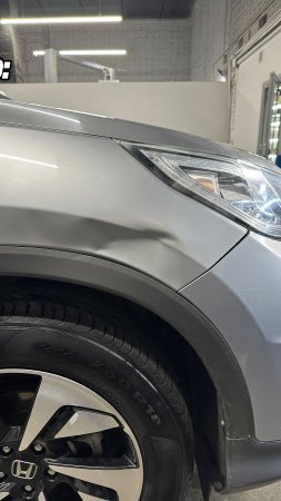 Ремонт вмятины без покраски на крыле автомобиля Honda CRV