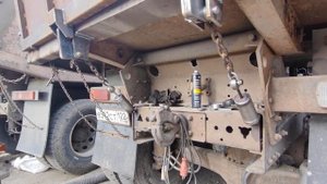 Камаз. Система запоров заднего борта.