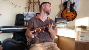 Устройство электроукулеле