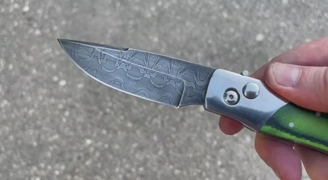 Выкидной нож "Барс": сталь - торцевой дамаск ; рукоять - микарта смотреть онлайн