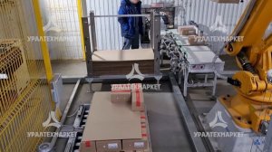 Робототехнический комплекс по укладке коробок с готовой продукцией на паллеты