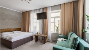 Номер делюкс семейный в отеле Тихонов