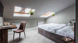 Номер стандарт на мансарде в отеле Тихонов