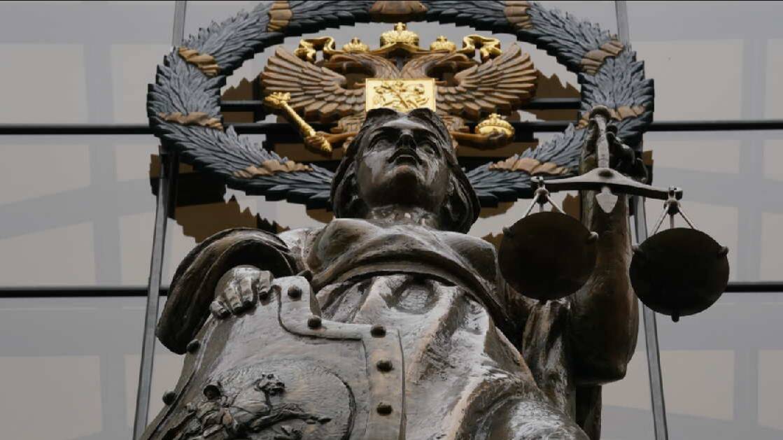 Нарисовавшим пентаграмму на двери военкора Трушнина запросили лишение свободы