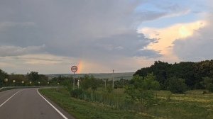 Радуга после сильного града и ливня