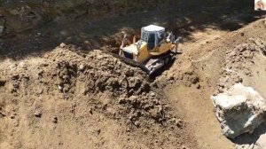 Строительство, срезаем горный склон очередной обзор