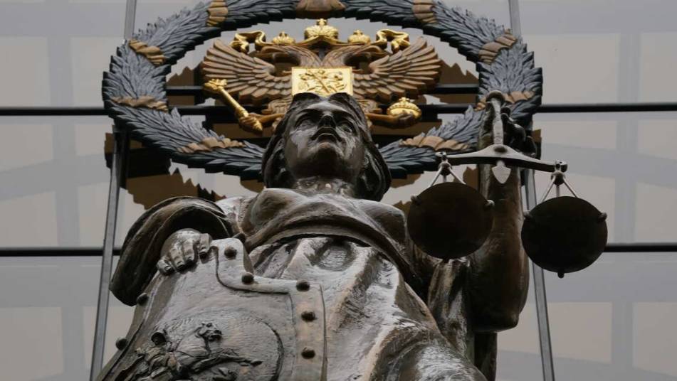 Нарисовавшим пентаграмму на двери военкора Трушнина запросили лишение свободы