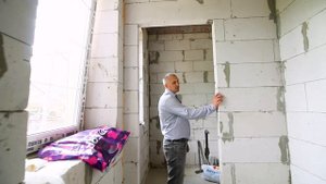 Двухэтажный дом из газобетона. Отделка дома японскими фасадами.