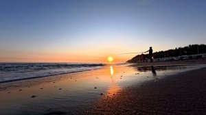 Летний закат в Сочи на берегу Чёрного моря